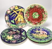 Set of nine Maling, Newcastle pottery plates, many with tube lined decoration including a galleon ship and Windmill, 29cm diameter